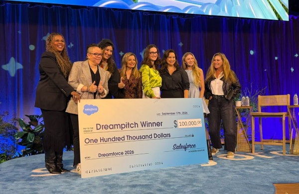 Tess Valbuena with DreamPitch 2026 co-winners and finalists holding the grand prize check at Dreamforce